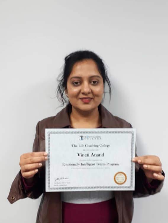 Vineti holding an Emotionally Intelligent Teams Program certificate