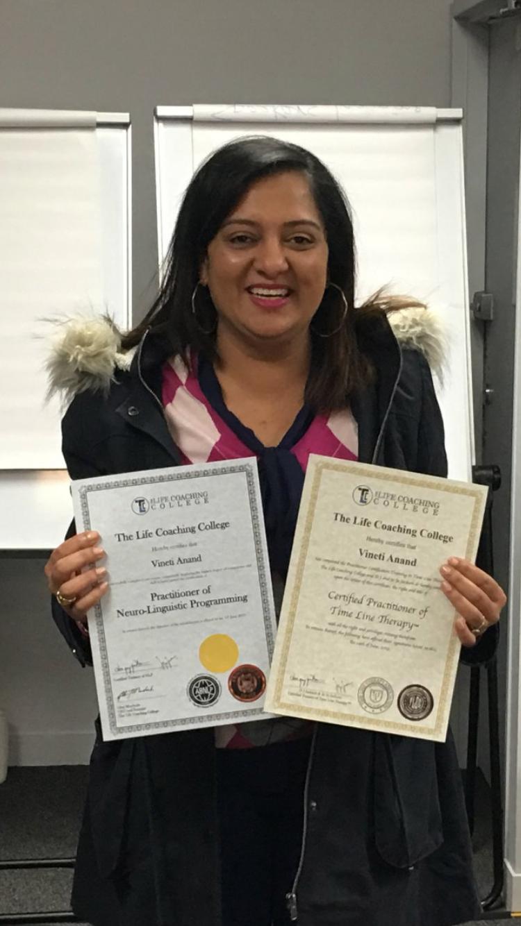 Vineti holding NLP and Time Line Therapy certificates